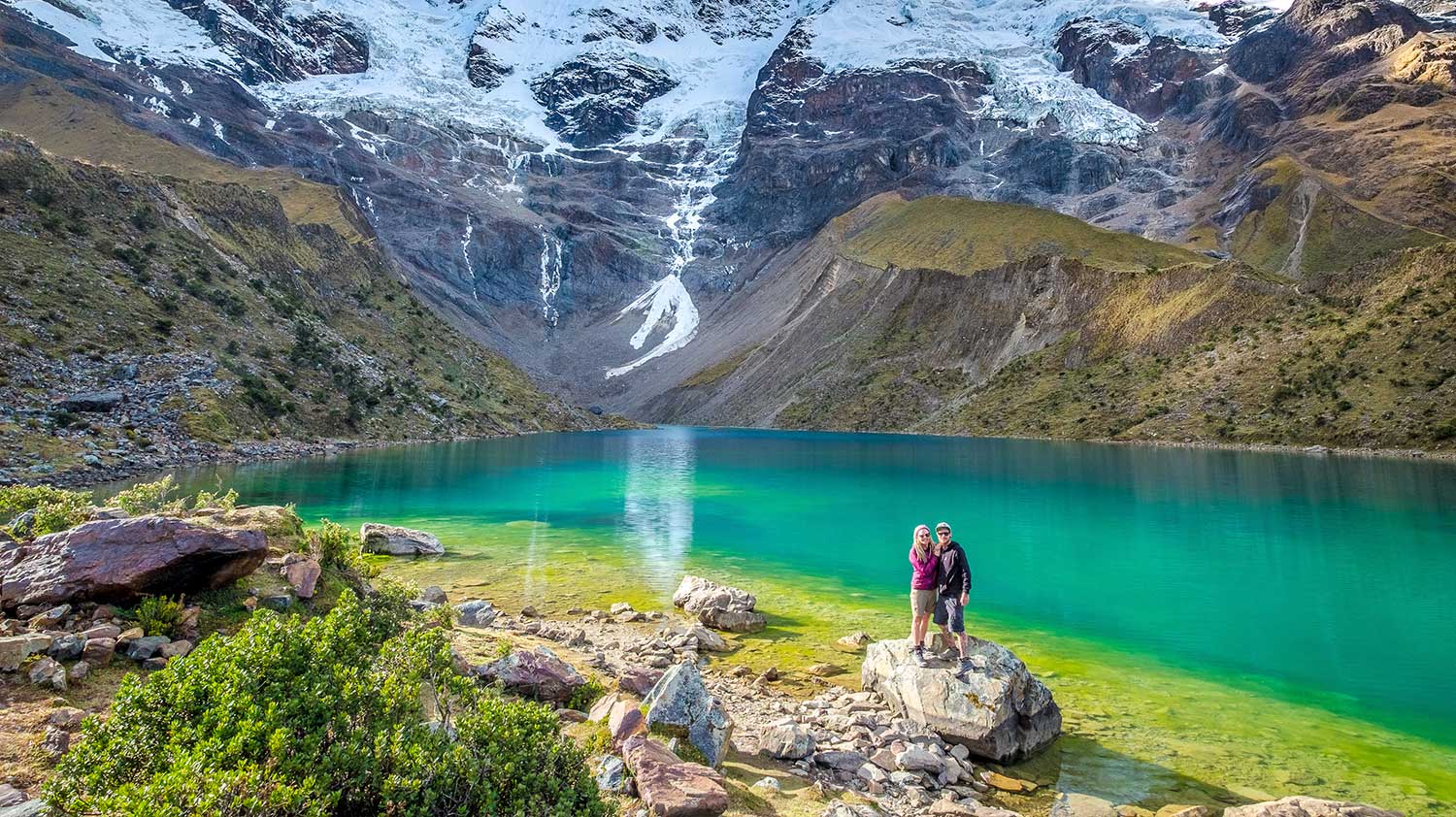 Couple enjoying nature at Humantay lake